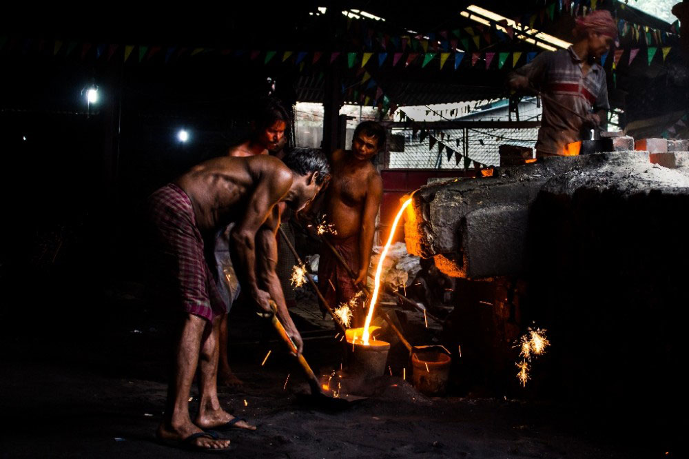 Kolkata,India-July 2015. Collecting the iron