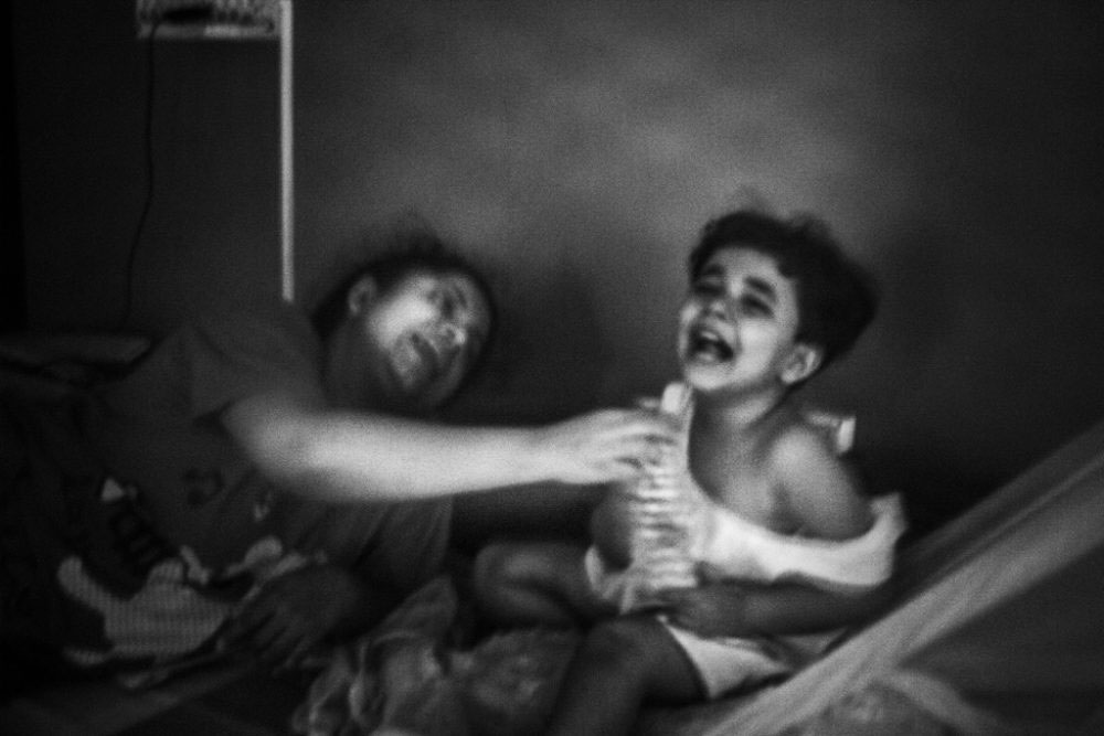 11. KOLKATA, INDIA - June 2016. Shreyasee, a single mother and her daughter having good time with each other.